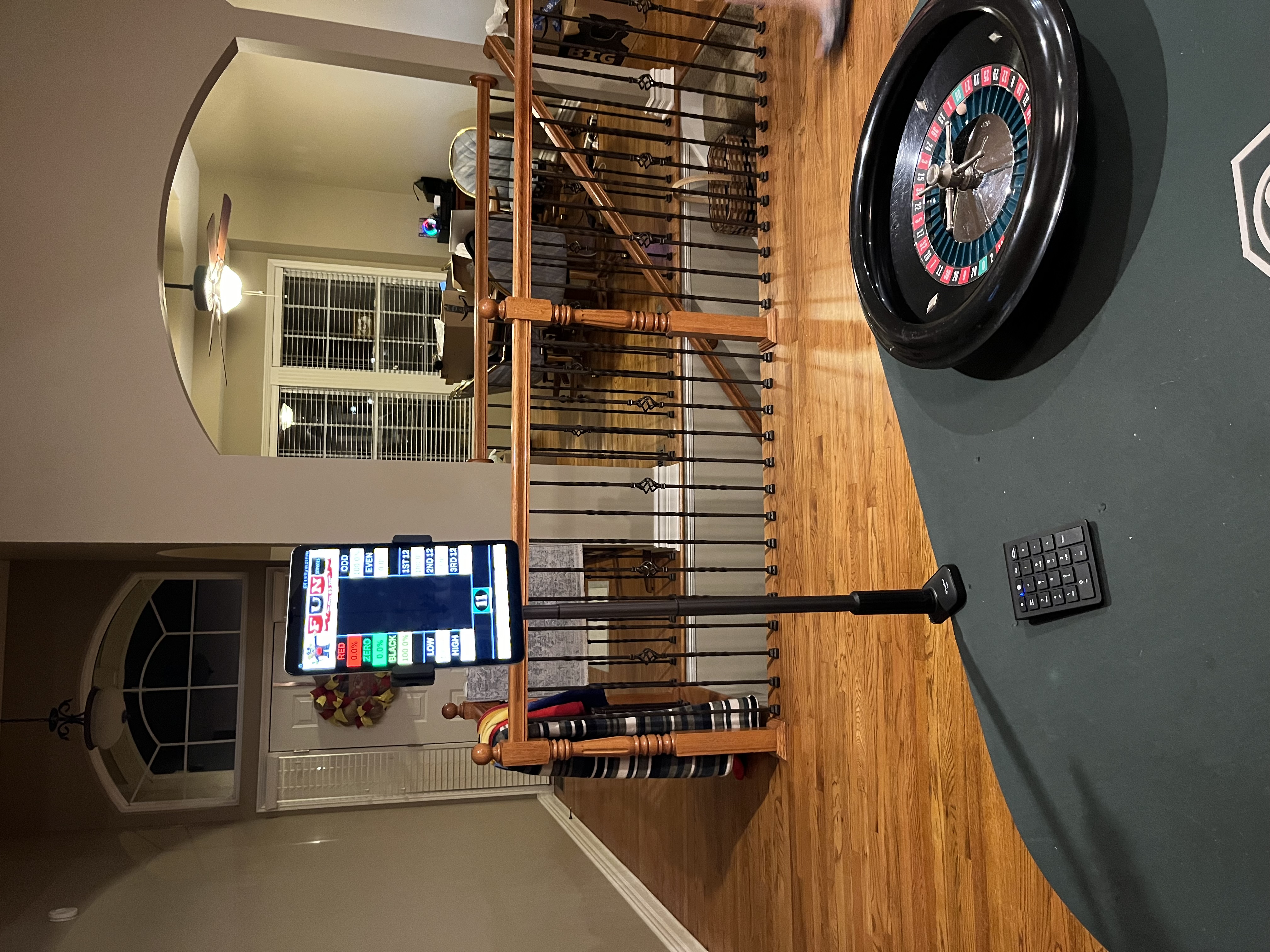 RouletteStatsPro mounted tablet display at a live roulette table